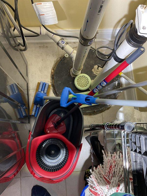 Responded to service call for sewer smell in basement. Upon inspection, identified dry floor drain trap as source of odor, allowing sewer gases to enter living space. Poured water into floor drain to refill P-trap and restore proper seal. Inspected surrounding plumbing fixtures including water heater connections and sump pump system for additional issues. Verified proper operation of sump pump discharge line and checked for any signs of sewage backup or drainage problems. All systems functioning properly after trap refill, eliminating odor issue.