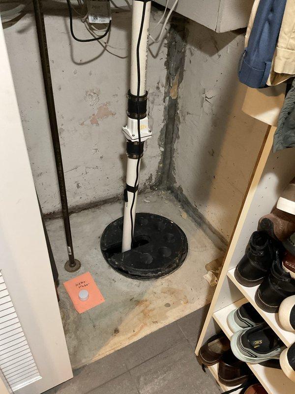 Responded to service call for sewer smell in basement. Upon inspection, identified dry floor drain trap as source of odor, allowing sewer gases to enter living space. Poured water into floor drain to refill P-trap and restore proper seal. Inspected surrounding plumbing fixtures including water heater connections and sump pump system for additional issues. Verified proper operation of sump pump discharge line and checked for any signs of sewage backup or drainage problems. All systems functioning properly after trap refill, eliminating odor issue.