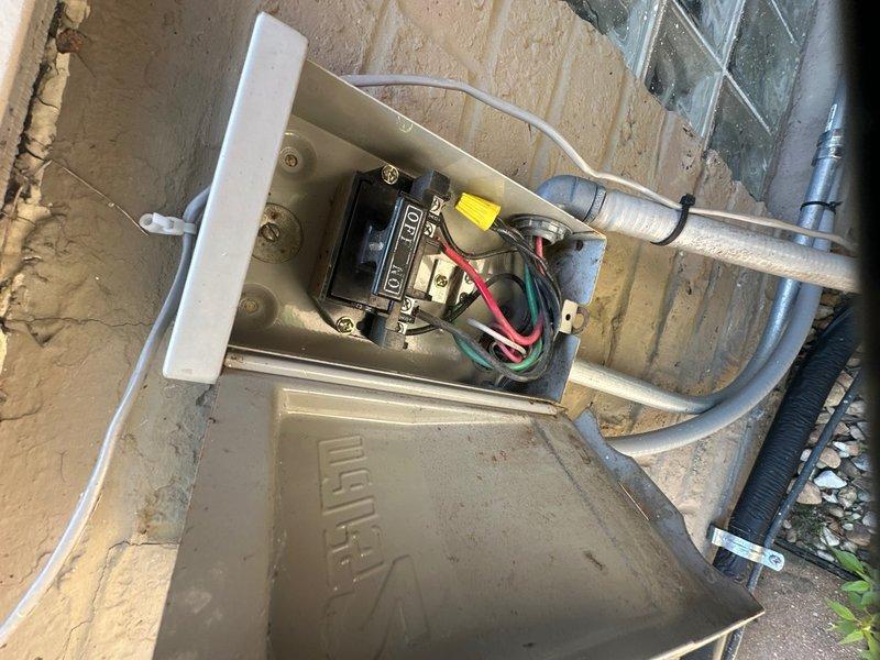 Completed comprehensive maintenance agreement service on split system HVAC equipment. Performed electrical diagnostics at outdoor condensing unit, verifying proper voltage and amperage at disconnect box. Accessed indoor air handler unit in attic space and tested capacitor performance, recording capacitance reading of 32.14 microfarads to ensure component is operating within manufacturer specifications. All electrical connections inspected and found secure with no signs of overheating or deterioration. System operational and performing to standards upon completion of maintenance inspection.