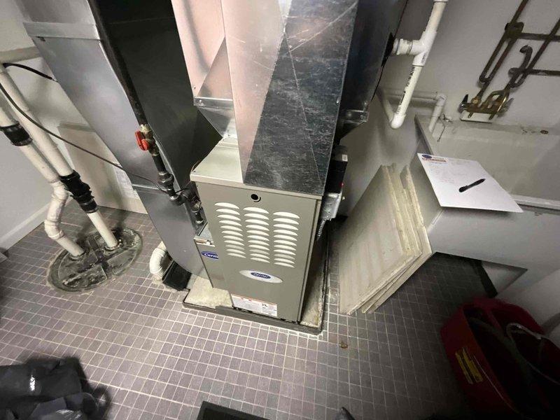 Evaluated 22-year-old air conditioning system with R22 refrigerant leak and provided replacement estimate for AC unit only. System located at ground level with easy access, existing furnace and ductwork to remain in place.