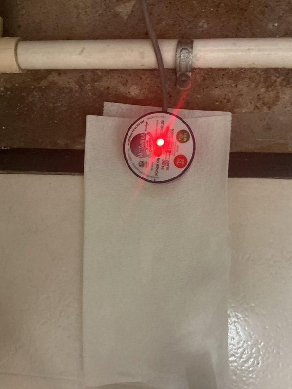 Responded to no cooling call and found PVC condensate drain line leaking, which had activated the safety float switch and shut down the system. Repaired the leaking PVC connection, verified proper drainage, reset the safety switch, and confirmed system operation restored with normal cooling function.