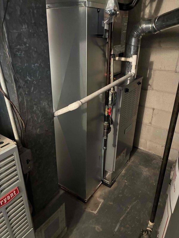 Completed full air conditioning system installation including replacement of outdoor condenser unit and indoor evaporator coil. Installed new 6-inch return air box with 20x25x1 filter rack and filter to improve air circulation and filtration. System was evacuated to 365 microns to ensure proper vacuum levels, refrigerant lines were installed with insulation, and all electrical and condensate connections were completed. Unit was tested and verified operational with proper airflow and cooling performance.