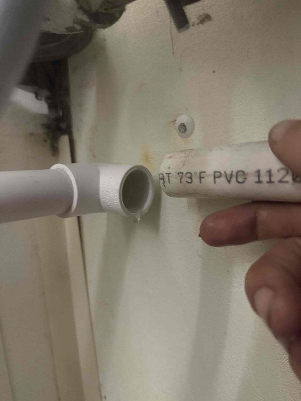 Responded to callback for condensate drain issue on recently installed unit where water was shooting from condensate pipe. Upon inspection, discovered improperly sized or connected PVC condensate drain line causing water discharge problem. Corrected condensate drain piping configuration, ensuring proper slope and secure connections with appropriate primer and cement application. Verified condensate system now draining properly without leaks or water discharge issues.