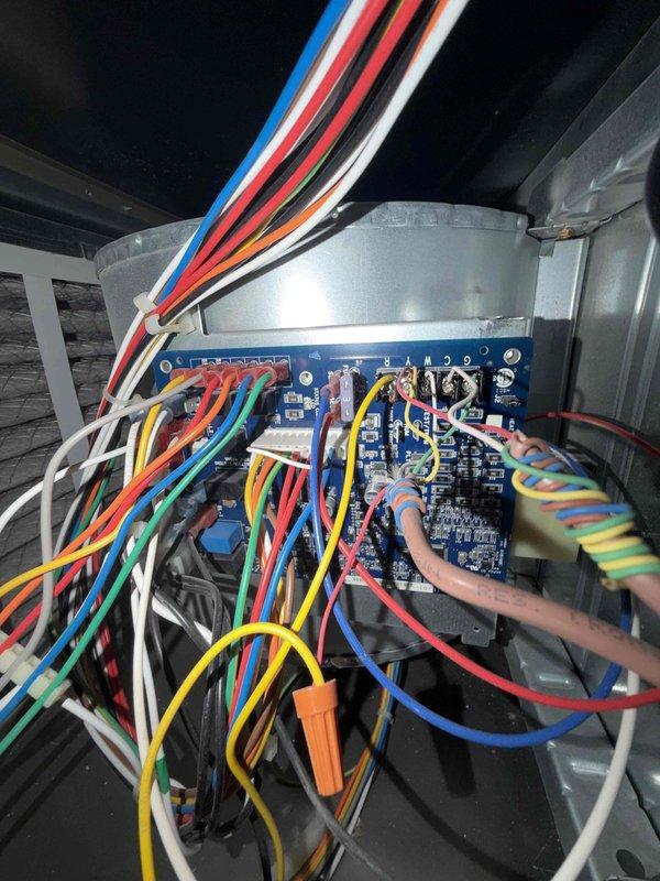 Completed preventive maintenance agreement service on dual condenser system. Inspected and serviced two outdoor condensing units, checked refrigerant levels, cleaned coils, and verified proper operation of both units. Performed interior air handler inspection, examined COMMAND2 control board connections and wiring, verified electrical components functioning properly, inspected ductwork plenum and condensate drainage system for proper operation and cleanliness.