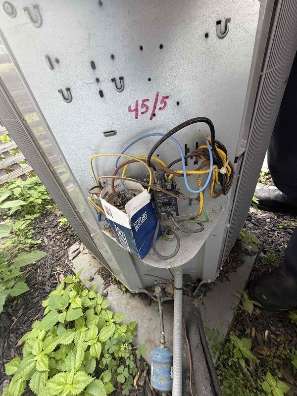 Completed scheduled HVAC maintenance agreement service including inspection and cleaning of two outdoor condensing units and replacement of 16x25x1 air filter. Documented system operating pressures with readings of 45 PSI high side and 15 PSI low side, verified proper electrical connections and capacitor function at outdoor units, and confirmed all components operating within normal parameters. System tested and left in proper working condition.