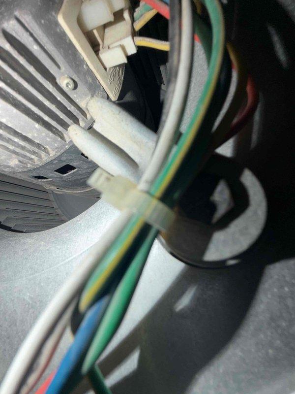 Completed comprehensive maintenance agreement service on two air conditioning systems. Inspected and documented humidifier installation including electrical connections, wiring harnesses, and ductwork integration. All components photographed and verified operational, with electrical connections and control mechanisms confirmed secure and functioning properly.