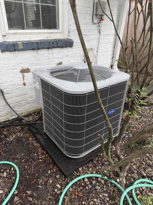Completed comprehensive cooling maintenance and system evaluation on residential air conditioning unit. Performed standard preventive maintenance procedures including inspection of condenser unit, verification of proper operation, and temperature measurements with digital instrumentation recording 88.5°F ambient conditions. Unit is accessible at ground level without ladder requirement, positioned on pad with adequate clearance from building exterior and landscaping elements.