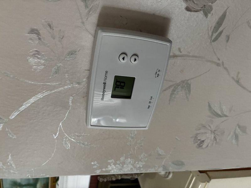 Performed comprehensive system evaluation of existing residential HVAC unit estimated at 10-15 years of age. Assessed current operational status, accessibility for replacement, and documented existing equipment configuration including air handler, ductwork, thermostat, and refrigerant lines. Provided customer with full system replacement estimate based on equipment age and operational assessment.