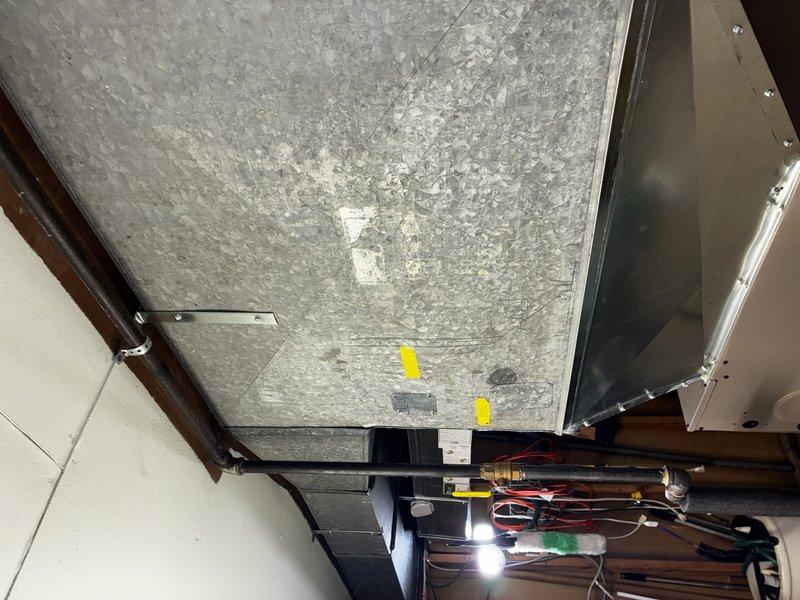 Performed comprehensive system evaluation of existing residential HVAC unit estimated at 10-15 years of age. Assessed current operational status, accessibility for replacement, and documented existing equipment configuration including air handler, ductwork, thermostat, and refrigerant lines. Provided customer with full system replacement estimate based on equipment age and operational assessment.