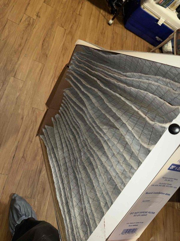 Performed routine HVAC maintenance agreement service. Inspected and replaced heavily soiled pleated air filter showing significant dust and debris accumulation with new filter to restore proper airflow and system efficiency. Documented filter condition with photographs showing before and after comparison, confirming successful completion of filter replacement service.