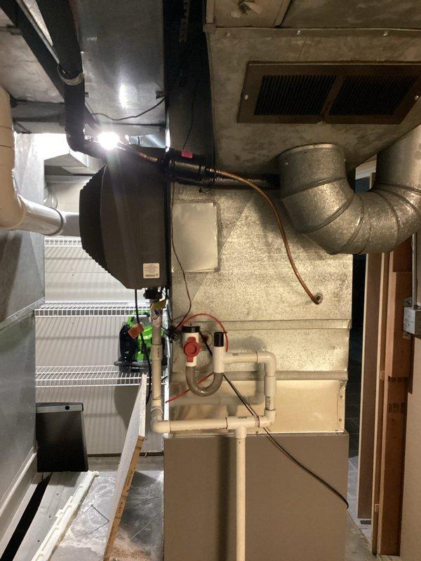 Completed comprehensive HVAC maintenance agreement inspection on residential cooling system. Performed thorough evaluation of indoor furnace unit, air handler components, refrigerant line connections, ductwork, and ventilation systems in basement mechanical room. Verified proper operation of all system components including condensate drainage, electrical connections, and airflow delivery. System found to be functioning within normal operating parameters with no deficiencies noted. Outdoor unit accessible without ladder requirement. All equipment inspected and confirmed in good working condition with no service recommendations needed at this time.