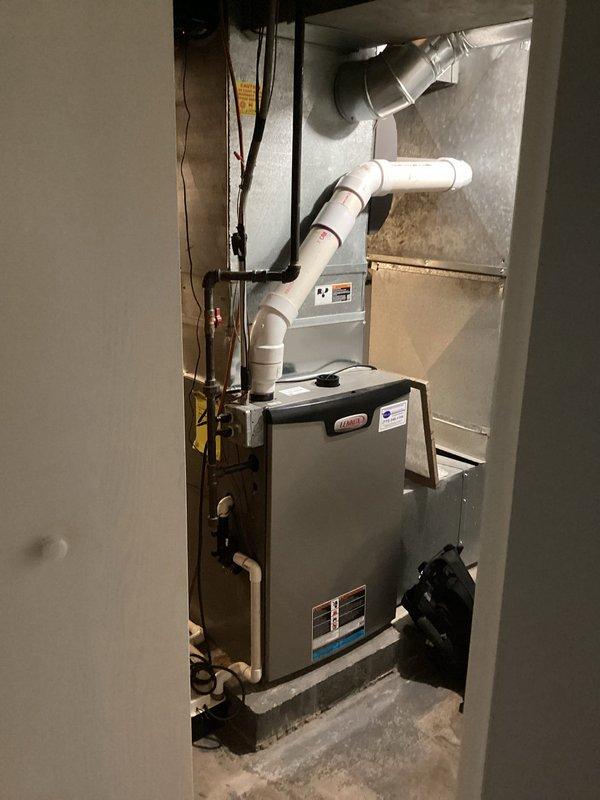 Completed comprehensive HVAC maintenance agreement inspection on residential cooling system. Performed thorough evaluation of indoor furnace unit, air handler components, refrigerant line connections, ductwork, and ventilation systems in basement mechanical room. Verified proper operation of all system components including condensate drainage, electrical connections, and airflow delivery. System found to be functioning within normal operating parameters with no deficiencies noted. Outdoor unit accessible without ladder requirement. All equipment inspected and confirmed in good working condition with no service recommendations needed at this time.
