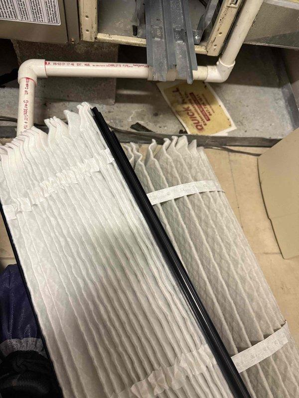 Completed comprehensive maintenance agreement service on two air conditioning systems. Replaced both 16x20x1 air filters, which showed significant dust and debris accumulation. Documented filter condition before and after replacement, confirming proper airflow direction and system accessibility in mechanical spaces.