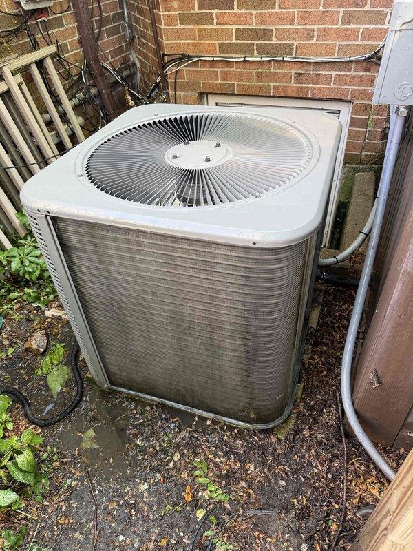 Completed routine maintenance agreement service on outdoor condensing unit. Performed system diagnostics using electronic testing equipment to verify proper refrigerant levels and system operation. Unit found to be operating within normal parameters with condenser coils showing typical outdoor weathering but maintaining adequate airflow and heat transfer efficiency.