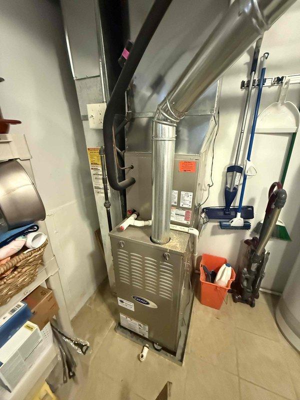 Completed cooling check, air conditioning general service, and maintenance agreement inspection on residential HVAC system. Performed standard diagnostics with supply air temperature reading of 72.2°F, inspected furnace unit and ductwork, verified proper operation of heating and cooling components, and documented equipment condition with photos. All systems found operating within normal parameters with no immediate repairs required.