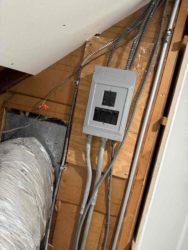 Conducted comprehensive evaluation of existing 30+ year old Space Pak HVAC system for full replacement. Unit located in attic space with favorable accessibility for equipment removal and installation. Assessed existing flexible ductwork, electrical panel configuration, and copper refrigerant line routing. Documented current system layout including metallic flex duct runs, electrical connections, and mechanical infrastructure to develop accurate replacement specifications and installation plan.