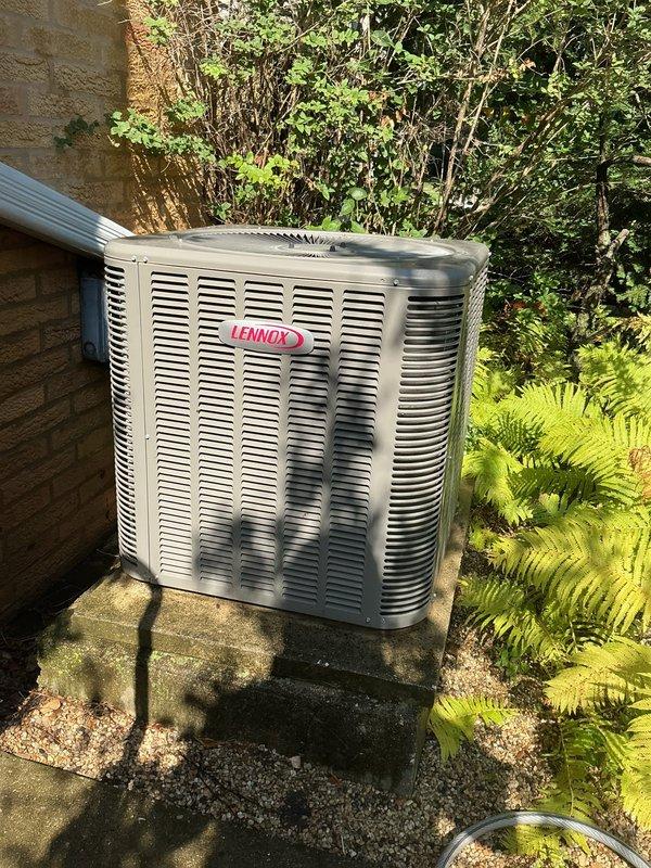Completed comprehensive HVAC maintenance agreement inspection on Lennox air conditioning system. Customer reported rattling noise from unit, though system was operational at time of service. Performed thorough visual inspection of both indoor air handler cabinet and outdoor condensing unit. Indoor inspection revealed properly mounted control board with organized wiring harnesses, functional blower motor assembly, and all safety labels intact. Outdoor unit inspection showed Lennox condenser in good operating condition on stable concrete pad with adequate clearance from surrounding vegetation. All electrical connections secure, refrigerant lines properly insulated, and conduit properly mounted to building exterior. System tested and found operating within normal parameters. No rattling noise detected during service visit. Documented equipment condition with photographs for service records. Advised customer to monitor system and report if noise recurs for further diagnostic evaluation.