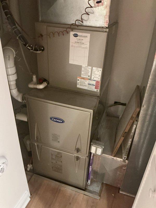 Completed comprehensive HVAC maintenance agreement service on Carrier system, including inspection of outdoor condenser unit and indoor air handler/furnace. Verified proper operation of all components, checked refrigerant lines and electrical connections at disconnect box, and replaced 16x25x1 air filter per agreement terms.