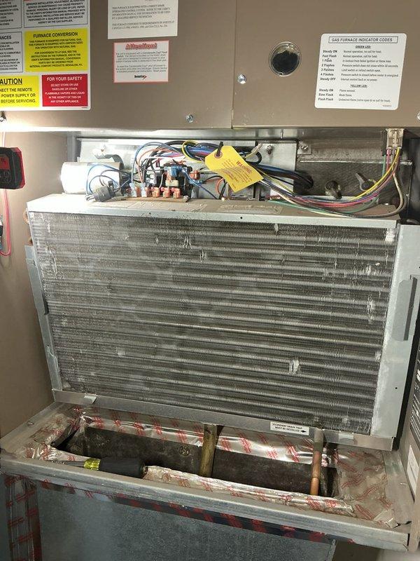 Completed scheduled maintenance on residential air conditioning system. Inspected evaporator coil assembly, verified proper operation of all electrical components and wiring connections, checked thermostat functionality, and confirmed system cooling performance. Unit found to be in good working condition with no major issues identified.