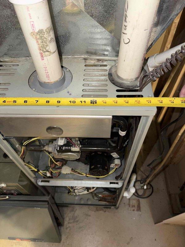 Provided comprehensive HVAC system replacement estimate for small residential application in basement installation, presenting three-tier Carrier equipment options. Better tier included up to 14 SEER air conditioning unit paired with up to 95% AFUE natural gas furnace. Best tier featured up to 17 SEER cooling system with up to 96% AFUE gas furnace for improved efficiency. Premium tier offered up to 19 SEER air conditioner combined with up to 98% AFUE high-efficiency gas furnace for maximum energy savings. Documented existing system configuration including PVC venting penetrations, internal blower assembly, electrical connections, and ductwork interface to ensure proper equipment sizing and installation planning for complete heating and cooling system replacement.