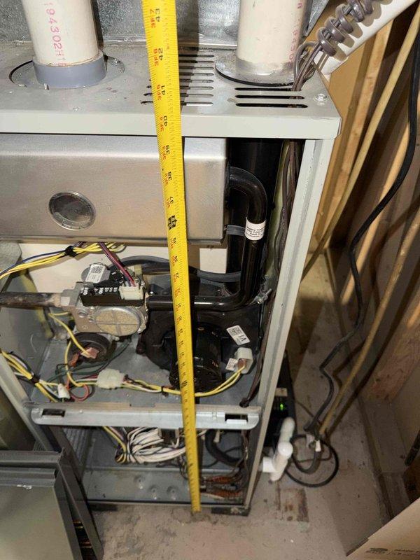 Provided comprehensive HVAC system replacement estimate for small residential application in basement installation, presenting three-tier Carrier equipment options. Better tier included up to 14 SEER air conditioning unit paired with up to 95% AFUE natural gas furnace. Best tier featured up to 17 SEER cooling system with up to 96% AFUE gas furnace for improved efficiency. Premium tier offered up to 19 SEER air conditioner combined with up to 98% AFUE high-efficiency gas furnace for maximum energy savings. Documented existing system configuration including PVC venting penetrations, internal blower assembly, electrical connections, and ductwork interface to ensure proper equipment sizing and installation planning for complete heating and cooling system replacement.
