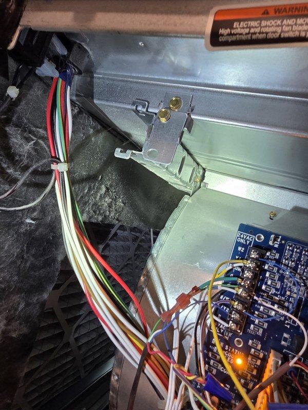 Responded to callback for recently installed 4-ton two-stage air conditioning system to address excessive noise, loose duct tape, and voltage drop causing lights to dim at startup. Inspected electrical connections, capacitor, and contactor assembly; secured all wiring and verified proper installation of components. Documented control board and electrical panel configuration with photos for quality assurance purposes.