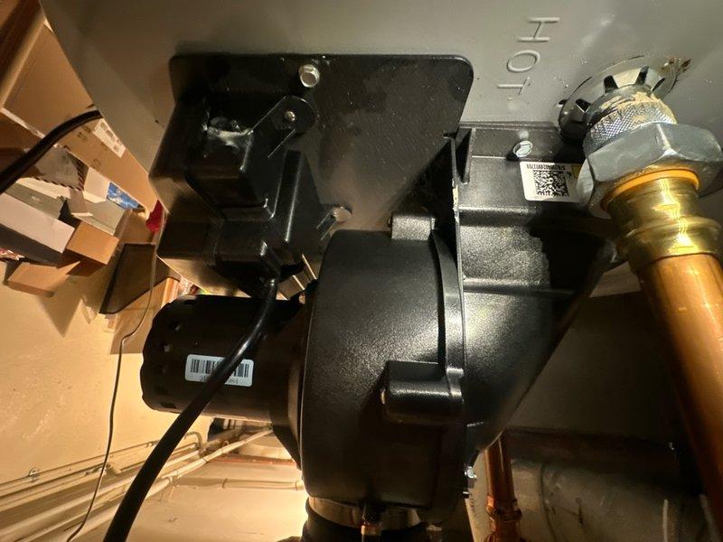 Responded to no hot water complaint on tanked water heater system. Upon arrival, observed blower motor cycling with 3-flash error code indicating thermal cutout (TCO) or pressure switch failure in open position. Diagnosed faulty pressure switch preventing proper ignition sequence. Replaced defective pressure switch assembly and verified proper venting and combustion air supply. Tested unit through multiple heating cycles to confirm reliable ignition, proper flame operation, and hot water delivery restored to normal function.