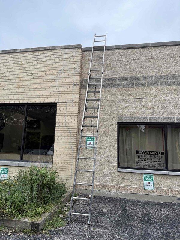 Responded to no cooling call at commercial facility. Used extension ladder to access rooftop HVAC unit. Upon inspection, identified that air conditioning system was not powering on. Diagnosed and resolved electrical issue preventing unit operation. System tested and confirmed operational with proper cooling restored.