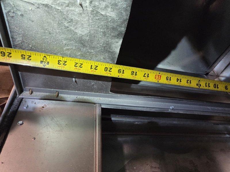 Responded to warranty callback for recently installed 4-ton, 2-stage air conditioning system to address excessive noise levels, loose duct tape, and voltage drop causing lights to dim at startup. Inspected installation, documented system measurements and ductwork clearances, and secured loose tape connections. Discussed soft start kit installation option to reduce inrush current and eliminate light dimming issue during compressor startup.
