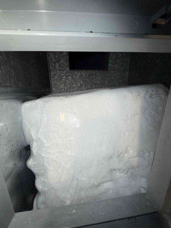 # HVAC Service Report - No Cooling Issue

Responded to service call for air conditioning system failing to reach preset temperature after extended runtime with excessive condensation on unit. Upon inspection, discovered severe ice buildup on evaporator coil, completely obstructing airflow and preventing proper heat exchange. 

Diagnosed frozen evaporator coil caused by restricted airflow. Shut down system to allow ice to thaw completely. Inspected blower wheel assembly and found accumulation of dust and debris on blades affecting air circulation. Cleaned blower wheel thoroughly to restore proper airflow velocity. Verified blower motor operation and confirmed adequate RPM after cleaning.

Once coil was fully defrosted, checked refrigerant charge and system pressures. Evaluated air filter condition and airflow across coil. System restored to normal operation with proper cooling capacity and temperature differential. Advised on importance of regular filter maintenance to prevent future fr