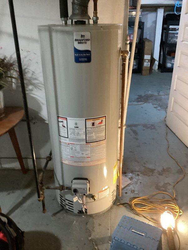 Completed comprehensive HVAC maintenance agreement service including full system inspection of Carrier air handler unit and Bradford White water heater. Performed routine maintenance checks on both systems, verified proper operation of all components, replaced 16x20x1 air filter, and documented equipment conditions with photographic records for maintenance history files.