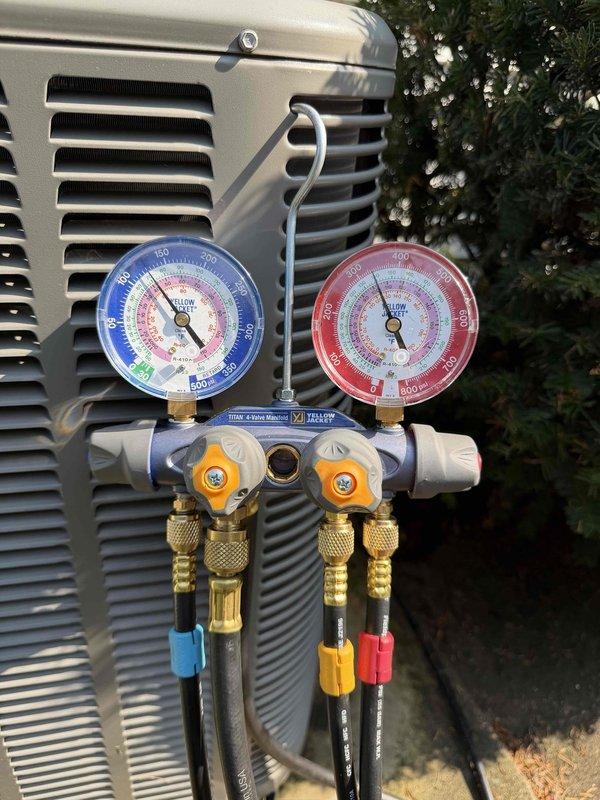# HVAC Service Report - No Cool Condition

Returned to property for follow-up diagnostic after allowing evaporator coil to fully thaw from previous frozen condition. Connected manifold gauge set to outdoor condensing unit to measure refrigerant pressures and assess system performance. Evaluated both suction and discharge pressures to determine proper refrigerant charge and system operation.

Inspected indoor air handler and furnace assembly. Noted airflow direction markings on ductwork. Observed air filter condition - standard pleated filter present at equipment. Checked for proper airflow across evaporator coil after thaw period completed.

Performed comprehensive system evaluation to identify root cause of no cooling complaint and frozen coil condition. Monitored refrigerant pressures during operation to verify adequate charge levels and proper system cycling. Assessed overall system performance and operational parameters to ensure unit returned to normal cooling function.