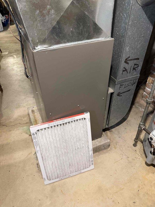 # HVAC Service Report - No Cool Condition

Returned to property for follow-up diagnostic after allowing evaporator coil to fully thaw from previous frozen condition. Connected manifold gauge set to outdoor condensing unit to measure refrigerant pressures and assess system performance. Evaluated both suction and discharge pressures to determine proper refrigerant charge and system operation.

Inspected indoor air handler and furnace assembly. Noted airflow direction markings on ductwork. Observed air filter condition - standard pleated filter present at equipment. Checked for proper airflow across evaporator coil after thaw period completed.

Performed comprehensive system evaluation to identify root cause of no cooling complaint and frozen coil condition. Monitored refrigerant pressures during operation to verify adequate charge levels and proper system cycling. Assessed overall system performance and operational parameters to ensure unit returned to normal cooling function.