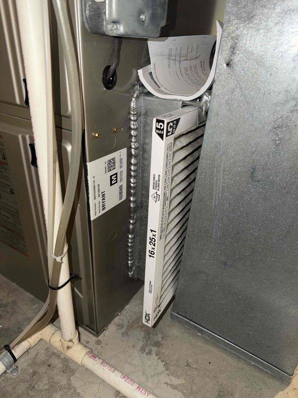 Responded to no cooling complaint in guest room. Upon inspection, found air filter heavily loaded with debris restricting airflow to affected zone. Replaced dirty 16x25x1 filter with new filter. Verified proper airflow restoration to all registers and confirmed cooling operation throughout home. System operating within normal parameters.