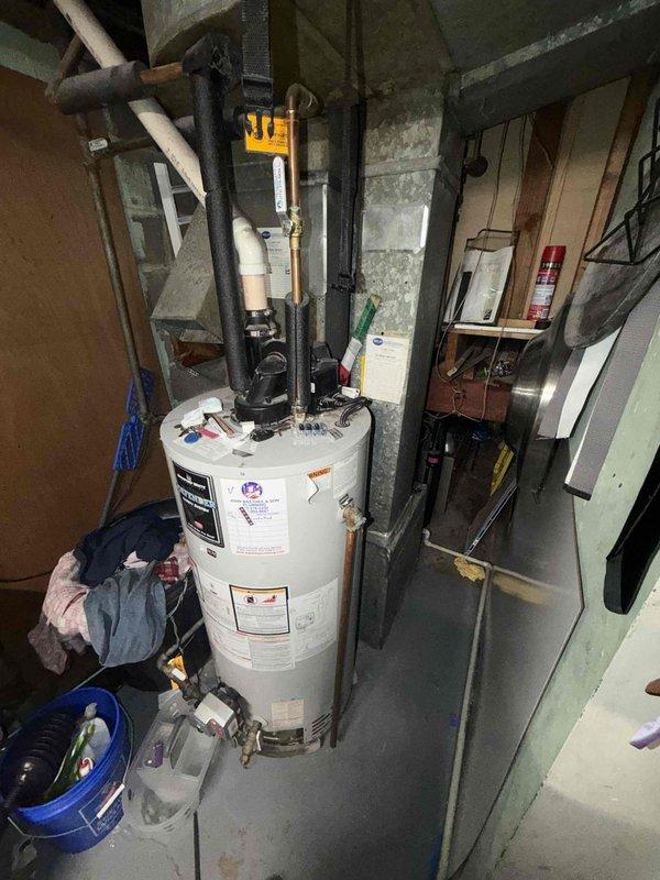 Completed HVAC maintenance agreement inspection at residential property. Accessed property using lockbox, performed comprehensive system evaluation of heating and cooling equipment located in basement utility area, documented equipment conditions with photographs, and verified all mechanical systems operating within normal parameters.