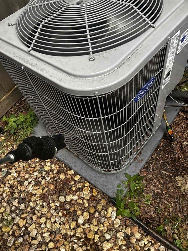 Performed preventive maintenance agreement inspection on two outdoor condensing units. Verified proper operation of both systems, inspected condenser coils and housing for cleanliness and structural integrity, and measured supply air temperature at register reading 83.65°F. Both units found in good working condition with adequate clearance and proper installation on gravel base pads.