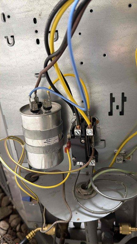 Responded to no cooling complaint with unit unable to maintain temperature below 80 degrees and low airflow. Performed diagnostic evaluation using manifold gauge set to check refrigerant pressures and system performance. Inspected electrical components including capacitor and contactor, verified wiring connections, and assessed overall system operation to identify root cause of cooling deficiency.