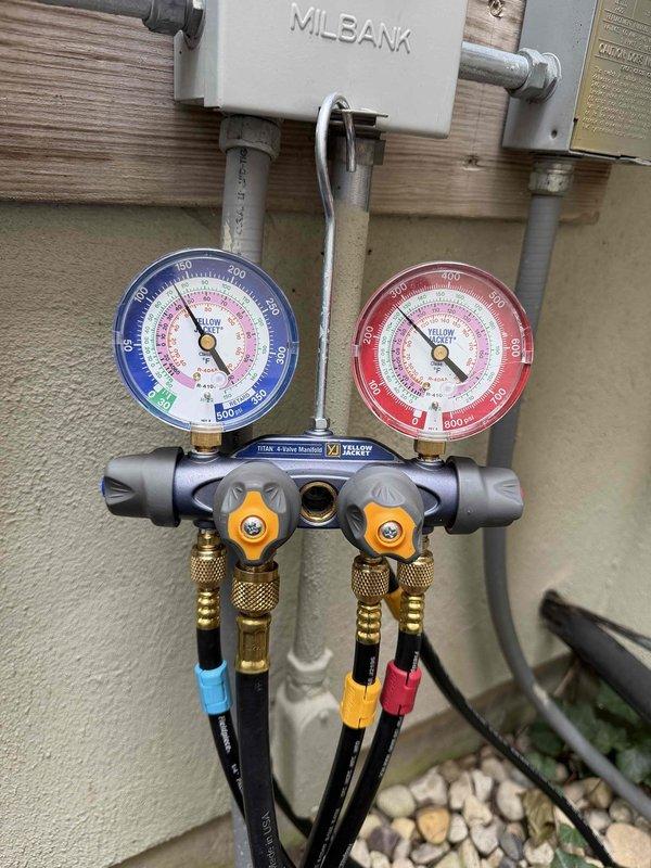 Responded to no cooling complaint with unit unable to maintain temperature below 80 degrees and low airflow. Performed diagnostic evaluation using manifold gauge set to check refrigerant pressures and system performance. Inspected electrical components including capacitor and contactor, verified wiring connections, and assessed overall system operation to identify root cause of cooling deficiency.
