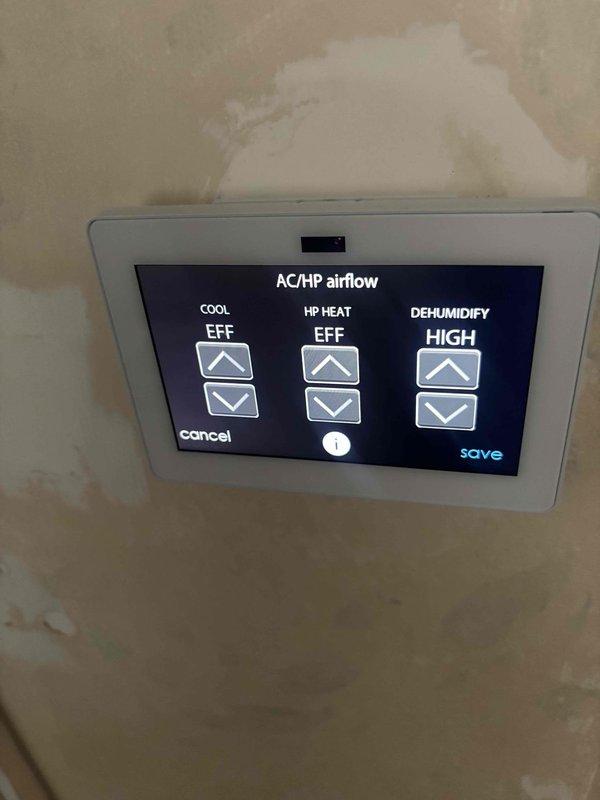 Responded to callback for thermostat displaying high humidity readings. Accessed airflow configuration menu and adjusted dehumidification settings from HIGH to appropriate level for optimal system performance. Inspected air filter condition and verified proper installation to ensure adequate airflow and humidity control throughout the system.