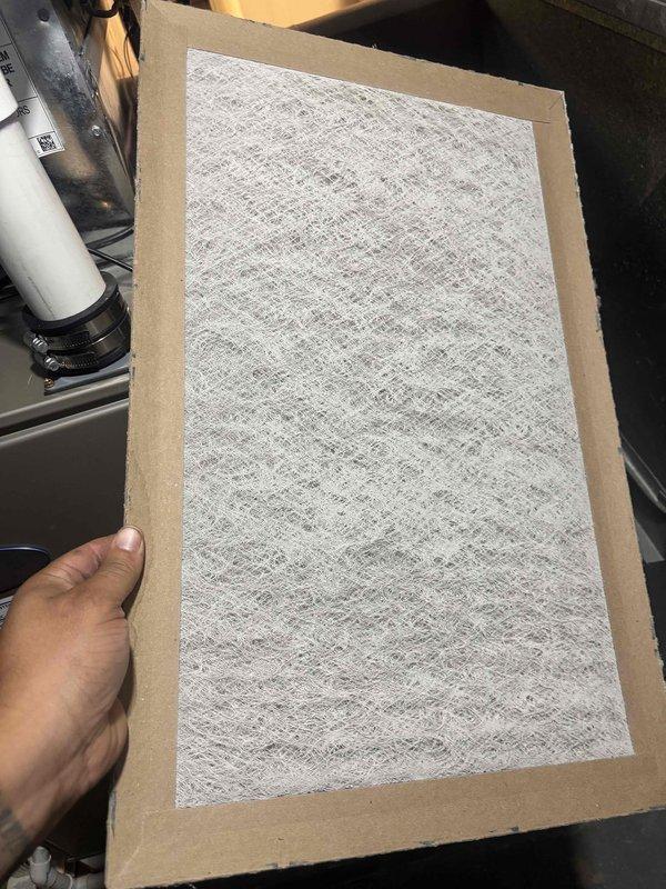 Responded to callback for thermostat displaying high humidity readings. Accessed airflow configuration menu and adjusted dehumidification settings from HIGH to appropriate level for optimal system performance. Inspected air filter condition and verified proper installation to ensure adequate airflow and humidity control throughout the system.