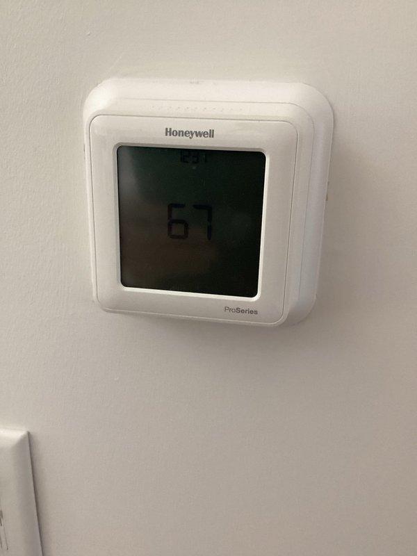 Completed comprehensive maintenance agreement service on two air conditioning systems. Performed system diagnostics, replaced air filters with 16x20x1 and 20x25x1 filters, and verified proper operation of Honeywell ProSeries thermostat displaying 67°F. Inspected Lennox furnace and air handler unit, checked refrigerant lines, electrical connections, and PVC intake/exhaust vents for proper function and condition.