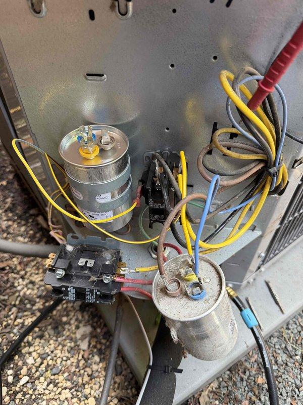 Completed comprehensive spring cooling tune-up on two air conditioning systems per maintenance agreement protocol. Performed thorough inspection of condenser coils for cleanliness and leaks, verified refrigerant charge levels, and tested indoor relative humidity levels. Inspected blower motor and wheel assemblies for debris accumulation, cycled all operating controls, and verified proper function of line voltage switches and wiring connections. Examined electrical components including capacitors and contactors for tight connections and signs of deterioration, confirmed condensate drainage system operating properly, and inspected refrigerant lines for visible leaks and insulation integrity. Both units found in good operating condition with all safety and performance parameters within manufacturer specifications.