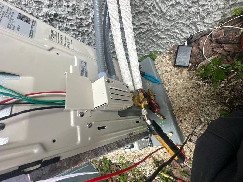 Responded to no-cooling complaint on newly installed Mitsubishi mini-split system. Upon arrival, verified electrical connections at disconnect box were properly terminated and system had successfully held vacuum during installation. Investigated 25-foot line set installation and confirmed refrigerant charge levels were at factory pre-loaded specifications. Conducted diagnostic testing of outdoor condensing unit and indoor air handler using manifold gauges to assess refrigerant pressures and system operation. Identified issue preventing cooling mode engagement and performed necessary corrections to restore proper system functionality. Unit tested and confirmed operating within manufacturer specifications upon completion.