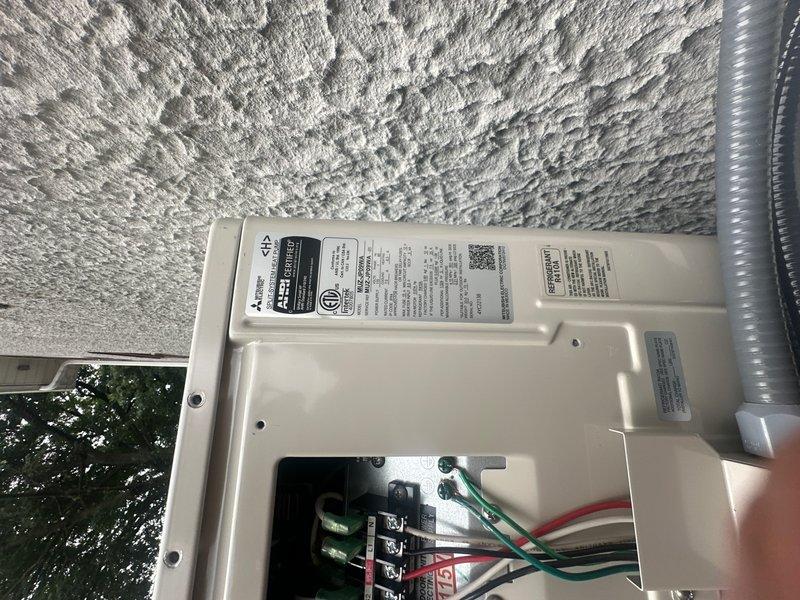 Responded to no-cooling complaint on newly installed Mitsubishi mini-split system. Upon arrival, verified electrical connections at disconnect box were properly terminated and system had successfully held vacuum during installation. Investigated 25-foot line set installation and confirmed refrigerant charge levels were at factory pre-loaded specifications. Conducted diagnostic testing of outdoor condensing unit and indoor air handler using manifold gauges to assess refrigerant pressures and system operation. Identified issue preventing cooling mode engagement and performed necessary corrections to restore proper system functionality. Unit tested and confirmed operating within manufacturer specifications upon completion.