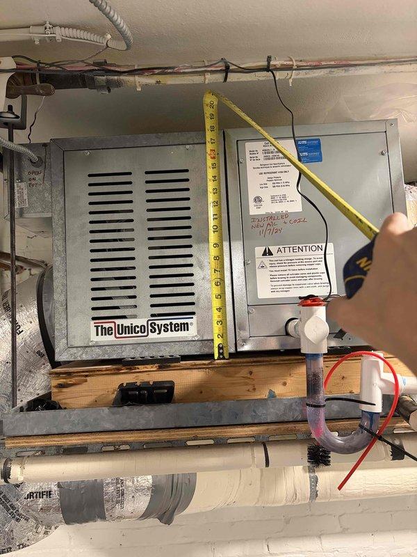 Responded to service call for failed Unico System blower module in residential installation. Performed diagnostic assessment of the high-velocity HVAC system, documented equipment dimensions and current installation configuration including electrical connections, control panel, and drainage components. Provided comprehensive estimate for full system replacement based on existing unit failure and overall system condition.