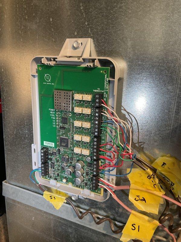 Responded to service call for Honeywell thermostat displaying system as running but not activating Carrier HVAC units. Inspected control board wiring and thermostat connections at terminal strip, verified proper wire terminations for heating and cooling circuits, and confirmed control board functionality. System restored to normal operation with thermostat properly communicating with HVAC equipment.