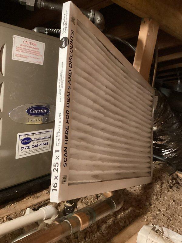Performed comprehensive HVAC maintenance agreement service on Carrier Infinity system. Accessed unit through basement crawl space, inspected and documented 16x25x1 pleated air filter condition, and accessed attic-mounted equipment via pull-down ladder to complete full system evaluation and routine preventative maintenance procedures.