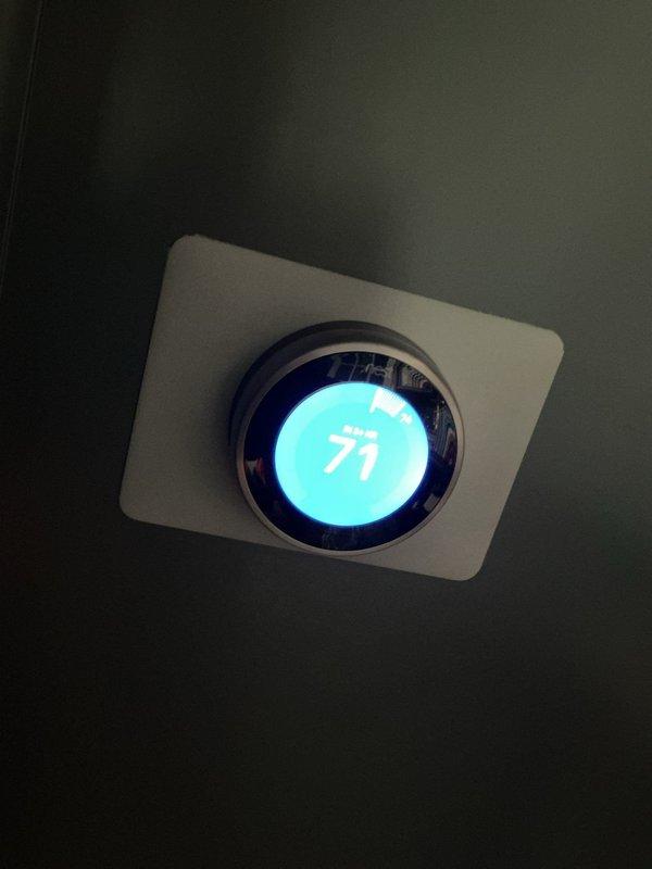 Responded to callback for non-operational first floor AC and blank Nest thermostat following previous maintenance visit. Upon arrival, inspected thermostat and HVAC system, verified proper power supply restoration, and confirmed thermostat display was functioning correctly showing 71°F. Tested first floor AC operation and verified system cooling properly with no issues found related to prior service work.