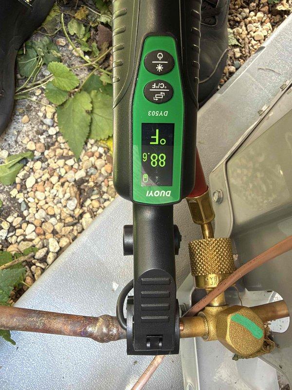 # Install Callback - Upstairs AC Unit Not Operating

Responded to callback for newly installed upstairs AC unit that was not functioning. Upon arrival, performed diagnostic testing on the system installed in July. Inspected control board and wiring connections, verifying all wire terminations were secure and properly seated. Measured refrigerant line temperatures using digital thermometer, recording 88.6°F at the service valve location. Examined outdoor unit connections and brass valve assembly for proper installation. Identified issue with control board operation and corrected the problem. Tested system operation and confirmed unit was cooling properly before departure.