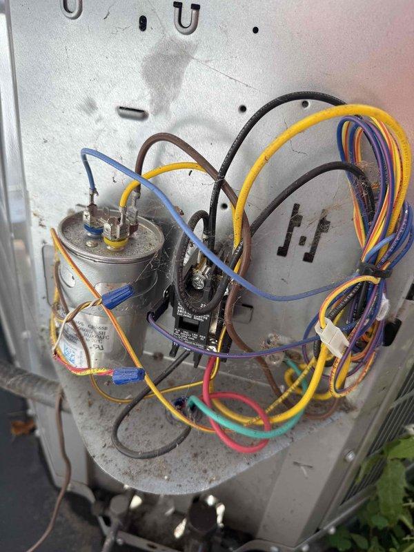 Completed preventive maintenance agreement service on residential HVAC system including Carrier furnace/air handler and outdoor condensing unit. Performed comprehensive inspection of electrical components in outdoor unit control panel, verifying proper operation of capacitor and contactor assembly with all color-coded wiring connections secure. Replaced 16x20x1 air filter at indoor air handler, inspected condensate drainage system, and documented equipment condition with photos for maintenance records.